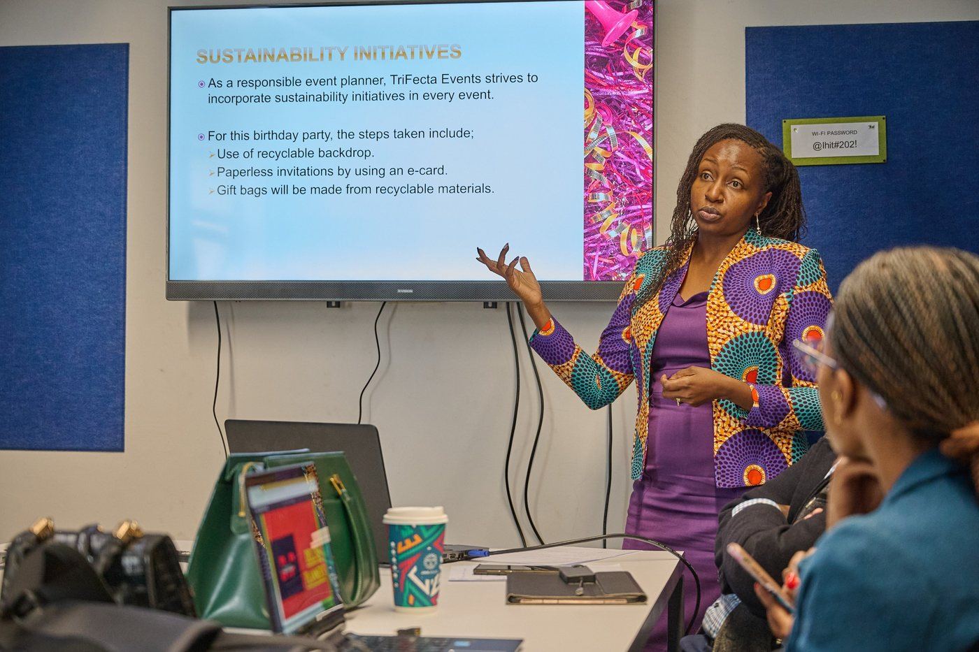Muthoni Wanjau presenting a sustainability brief to a class